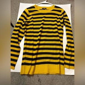 I am selling this bright, yellow, black stripe, long sleeve shirt